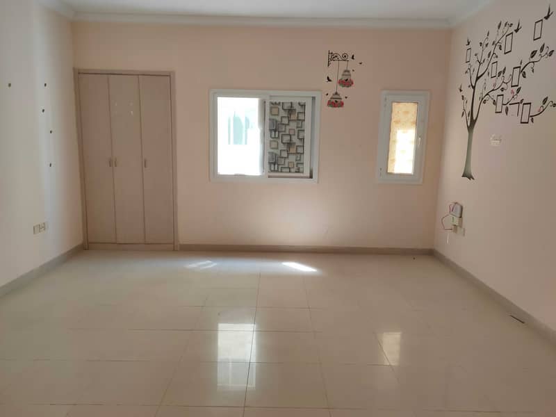 15DAYS FREE AMERICAN STYLE BIGGER STUDIO ONLY FOR 15K ON ROAD FAMILY BUILDING CLOSE TO AL MADINA SHOPPING CENTER
