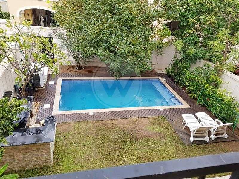 Extended quadplex with pool | Landscaped garden