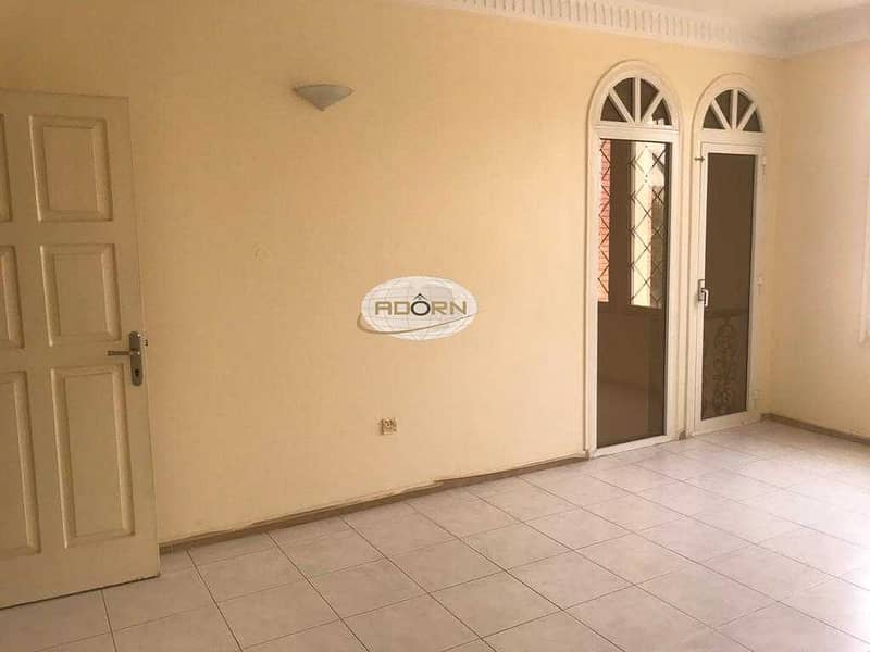 7 Spacious 4 bedroom plus maid villa with shared  pool in Umm Suqeim 1