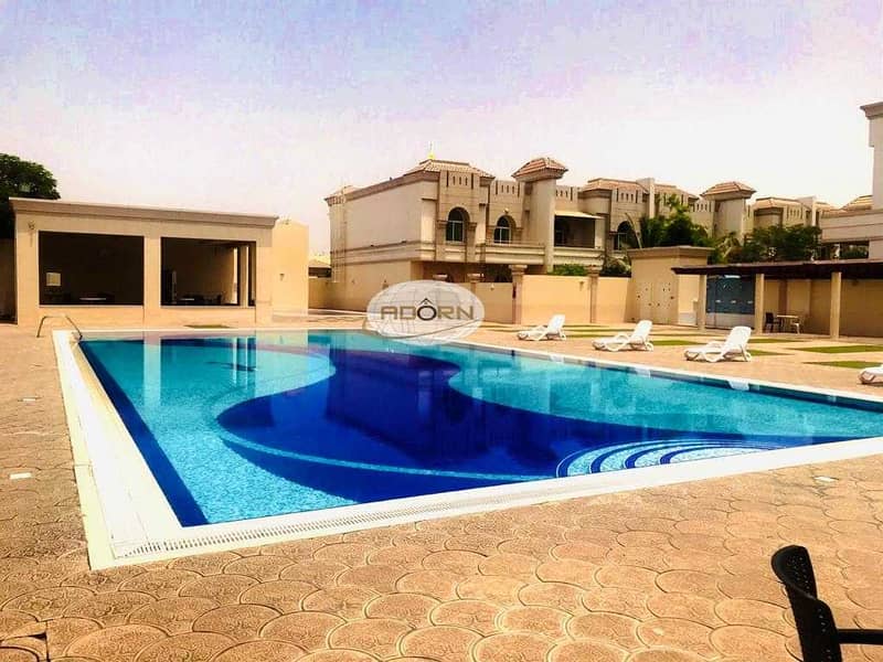 Excellent 4 bedroom plus maid compound villa with pool and gym in Jumeirah 3