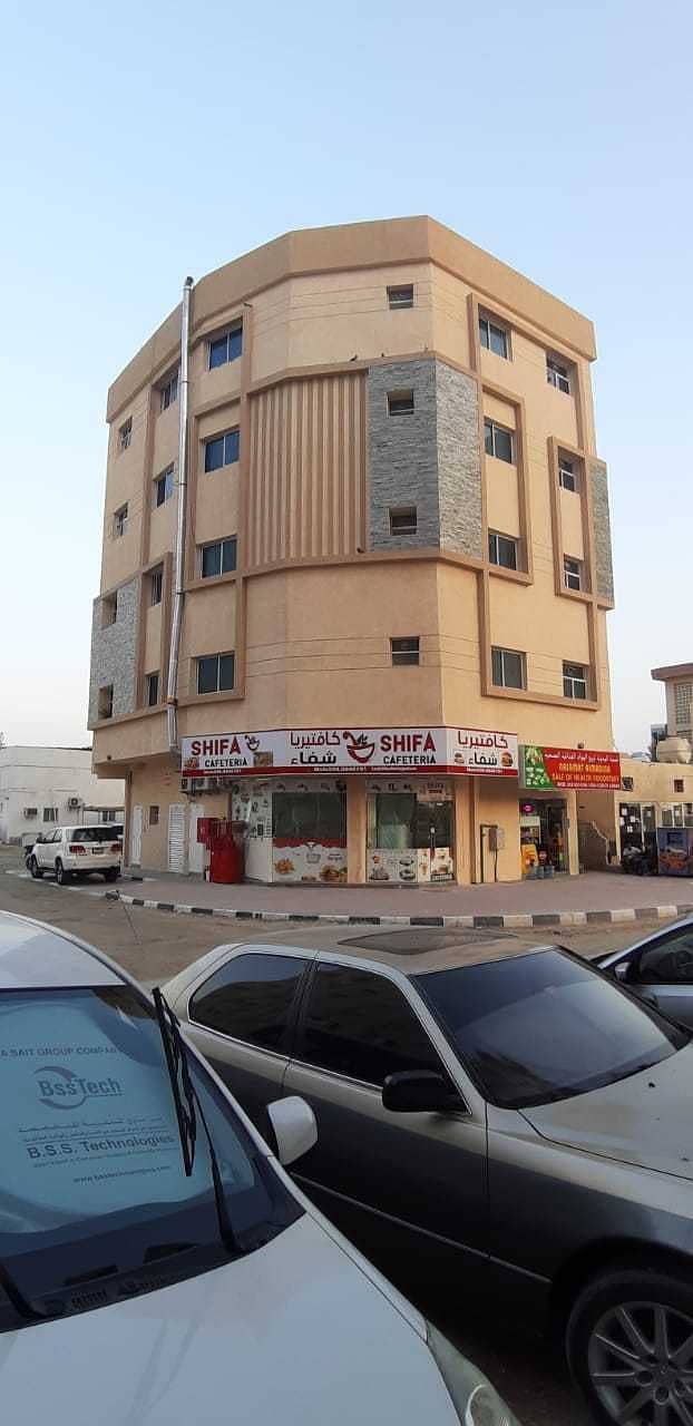 New building for sale in Al-Bustan, ground + 4 floors, an area of ​​2100 feet, corner of two streets