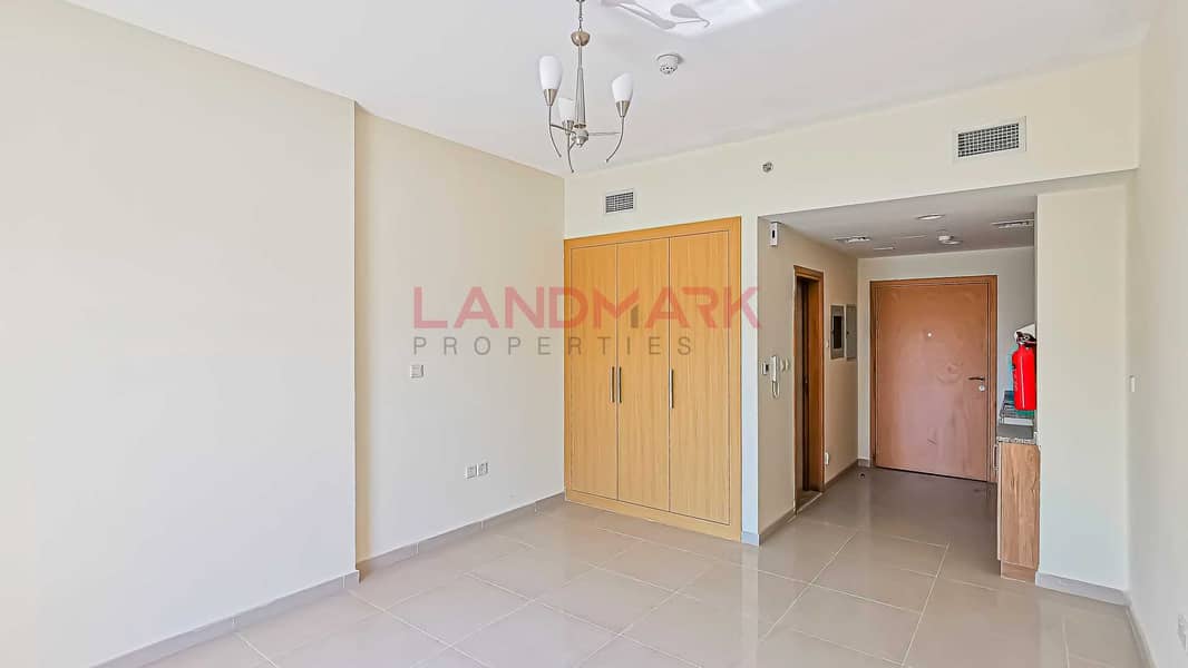 10 HOT | New Studio | Balcony facing on street | Parking | Pool | Gym | Next to gate 2 in JVC