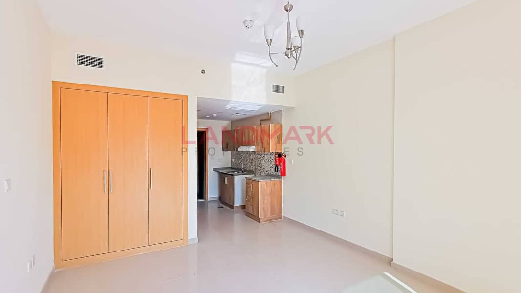 11 HOT | New Studio | Balcony facing on street | Parking | Pool | Gym | Next to gate 2 in JVC