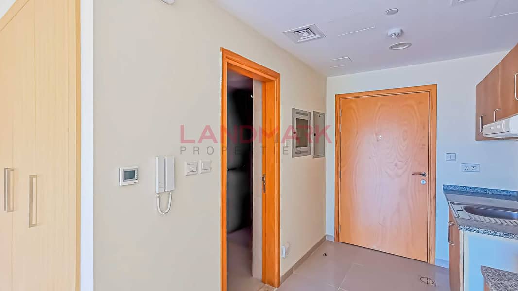 13 HOT | New Studio | Balcony facing on street | Parking | Pool | Gym | Next to gate 2 in JVC