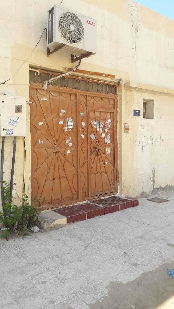 An Arab house for sale in Al Rashidiya Ajman, an area of 6,447 feet, residential investment, very excellent location