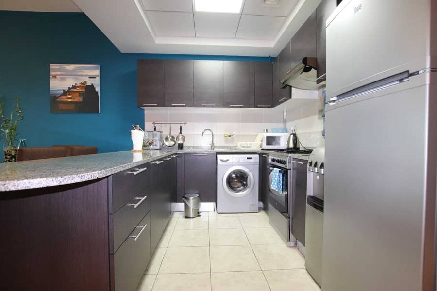 4 Fully Equipped Kitchen |Pool View | Middle Unit |1BR+Blcny