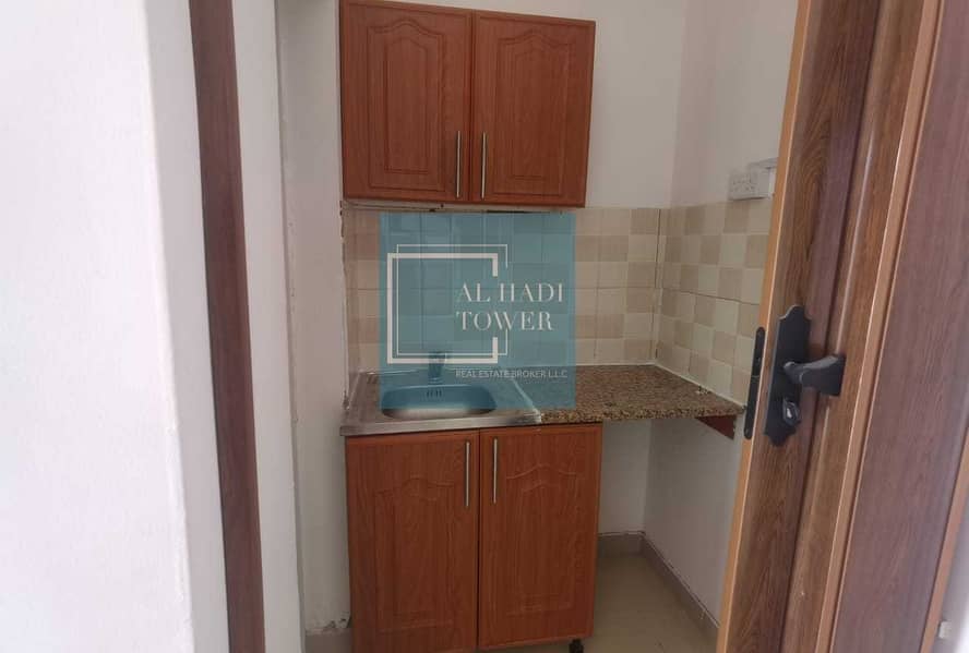 7 FOR RENT: STUDIO WITH ITEMS OF FURNITURES IN KHALIFA CITY A