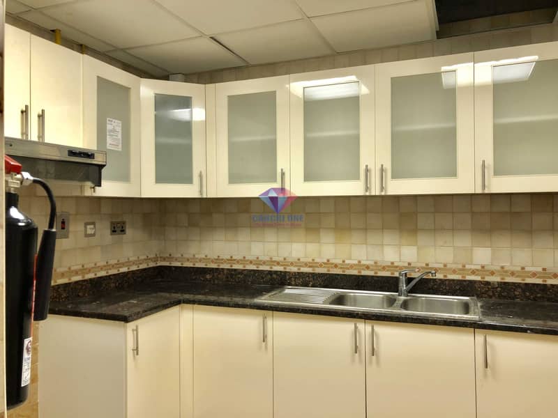 10 Close Kitchen Extravagant 1 BR with Parking + Complete Amenities!
