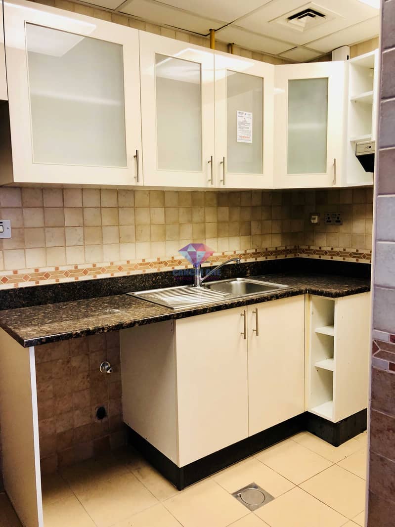 12 Close Kitchen Extravagant 1 BR with Parking + Complete Amenities!