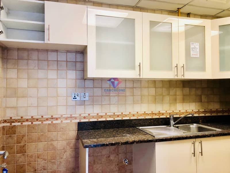 15 Close Kitchen Extravagant 1 BR with Parking + Complete Amenities!