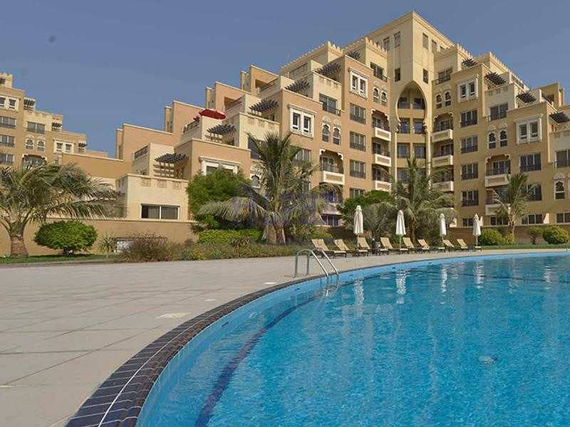 One bedroom at AL MARJAN ISLAND with a garden view