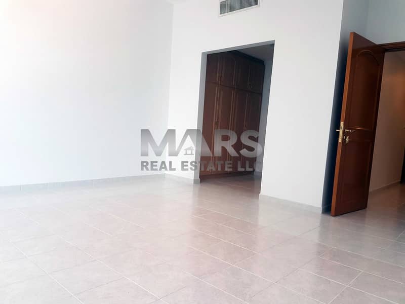 huge 5 bedroom apartment with maid room /very spacious .