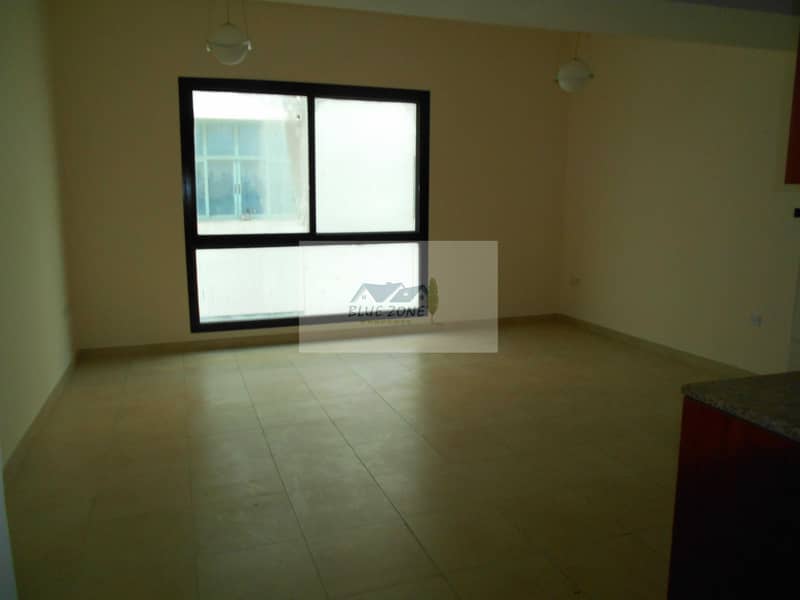 15 13 MONTHS STUDIO 6 CHEQUES 7 TO 8 MINUTES BY BUS TO DAFZA METRO LOCATED NEXT TO BILLO ICE CREAM DAMASCUS ROAD IN 24K
