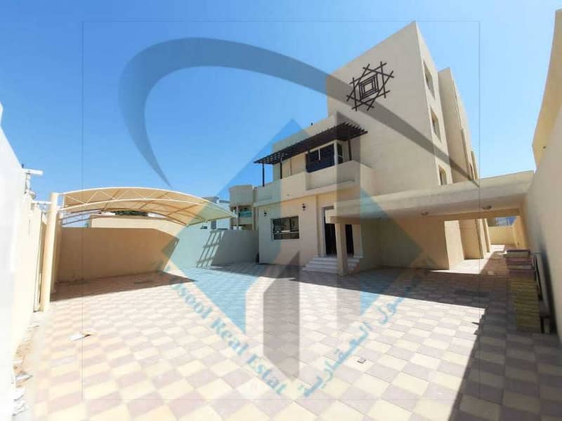 For sale a new villa, the first resident in the Emirate of Ajman, Al Rawda area, consisting of seven master bedrooms, a majlis, and a hall consisting of three floors with an internal elevator