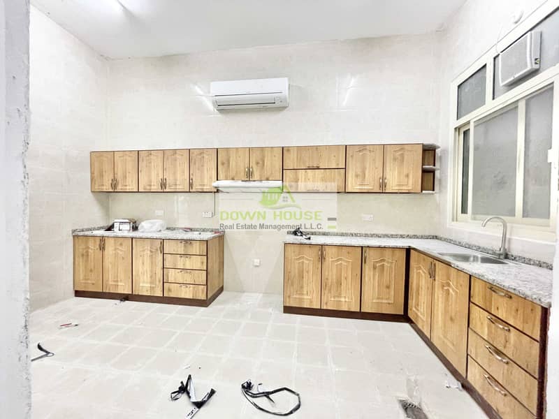 10 Haz / huge 4  bedroom hall apartment for rent in Khalifa city A