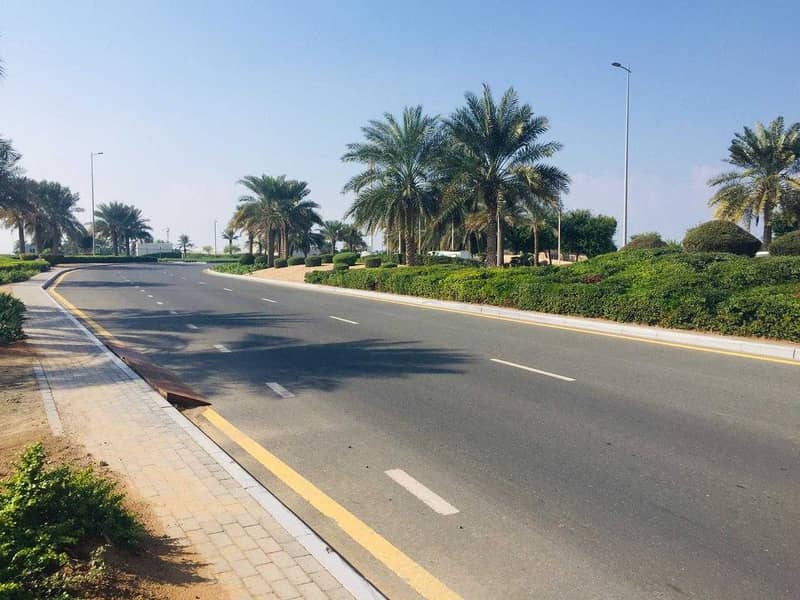 own  residential land in the best area in  Ajman, installments