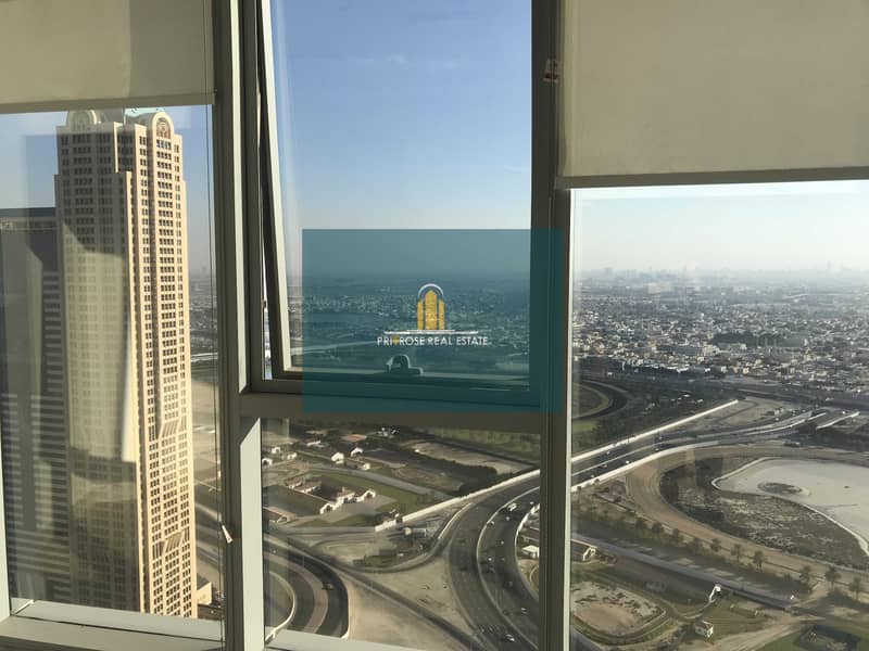 3 High Floor | 2 Parkings | Canal & Burj Al Arab View | Open Plan Fitted | Pantry