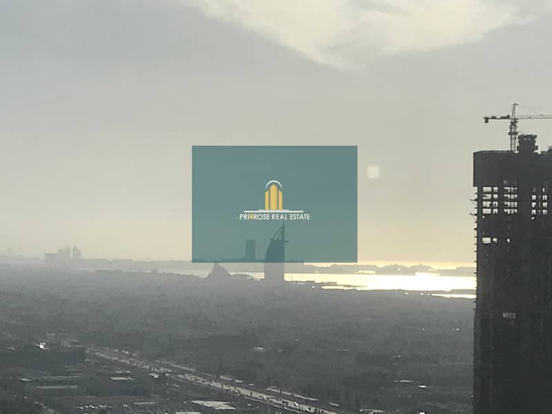 9 High Floor | 2 Parkings | Canal & Burj Al Arab View | Open Plan Fitted | Pantry