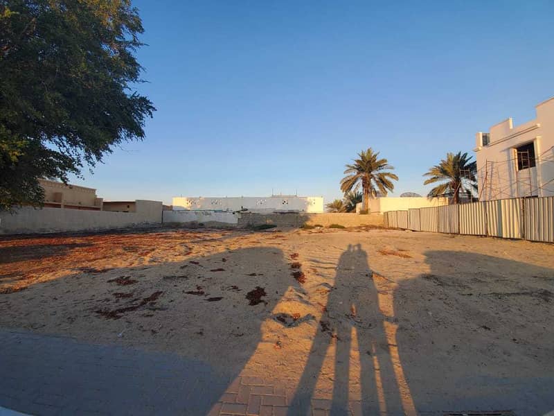 Land for sale in Sharjah / Umm Khanoor General Street in front of Al-Shaab Club Land for sale in Sharjah / Umm Khanoor General Street in front of Al-Shaab Club