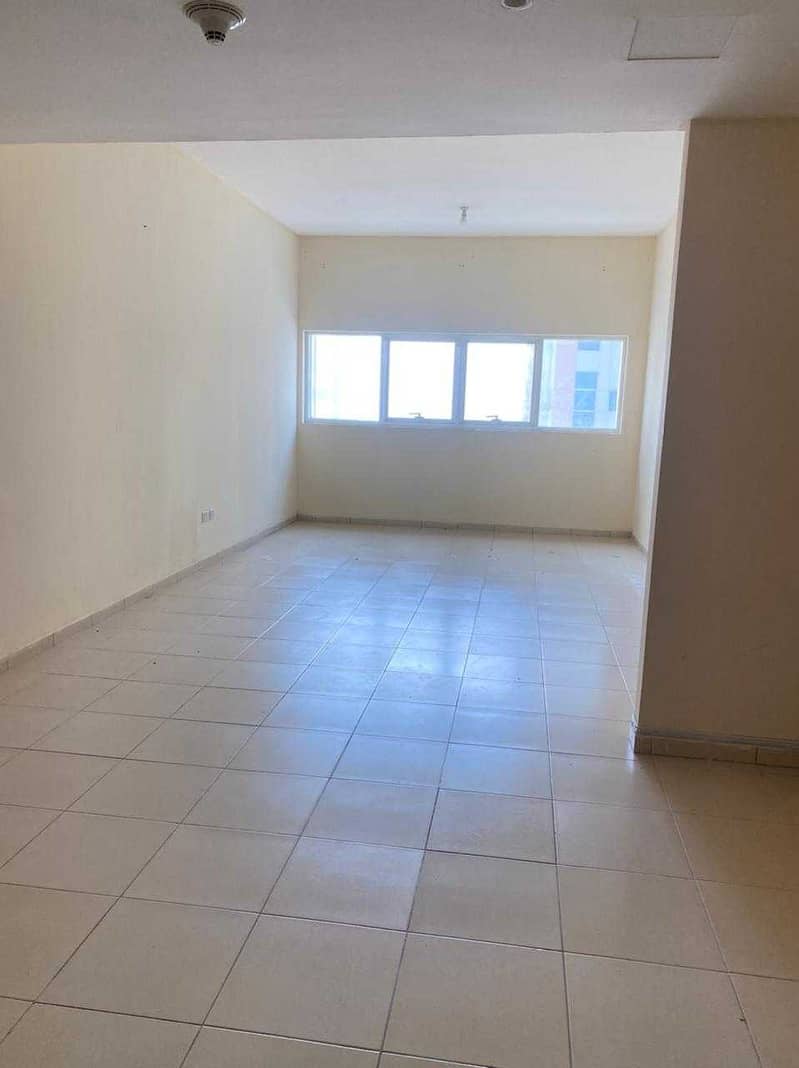 studio big size with parking for rent in Ajman one tower