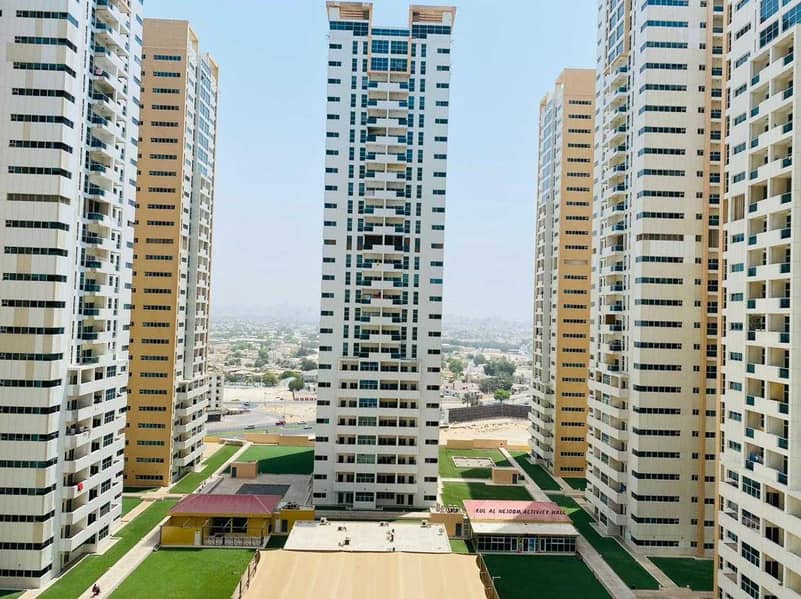 2 bhk closed kitchen garden view with parking for rent in Ajman one tower