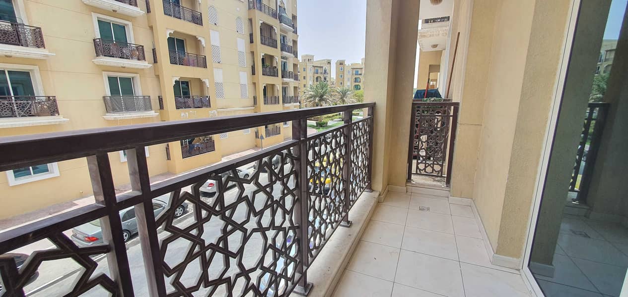 EMIRATES CLUSTER INTERNATIONAL CITY  ONE BED ROOM FOR RENT WITH BALCONY ONLY 22,000 YEARLY