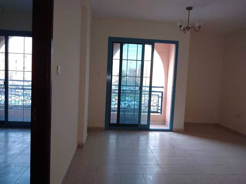 NEAT CLEAN ONE BEDROOM IN PERSIA CLUSTER  WITH DOUBLE BALCONY @ 23,000 YEARLY