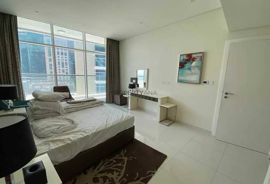 9 Beautifully Furnished 2BR | Partial Canal View