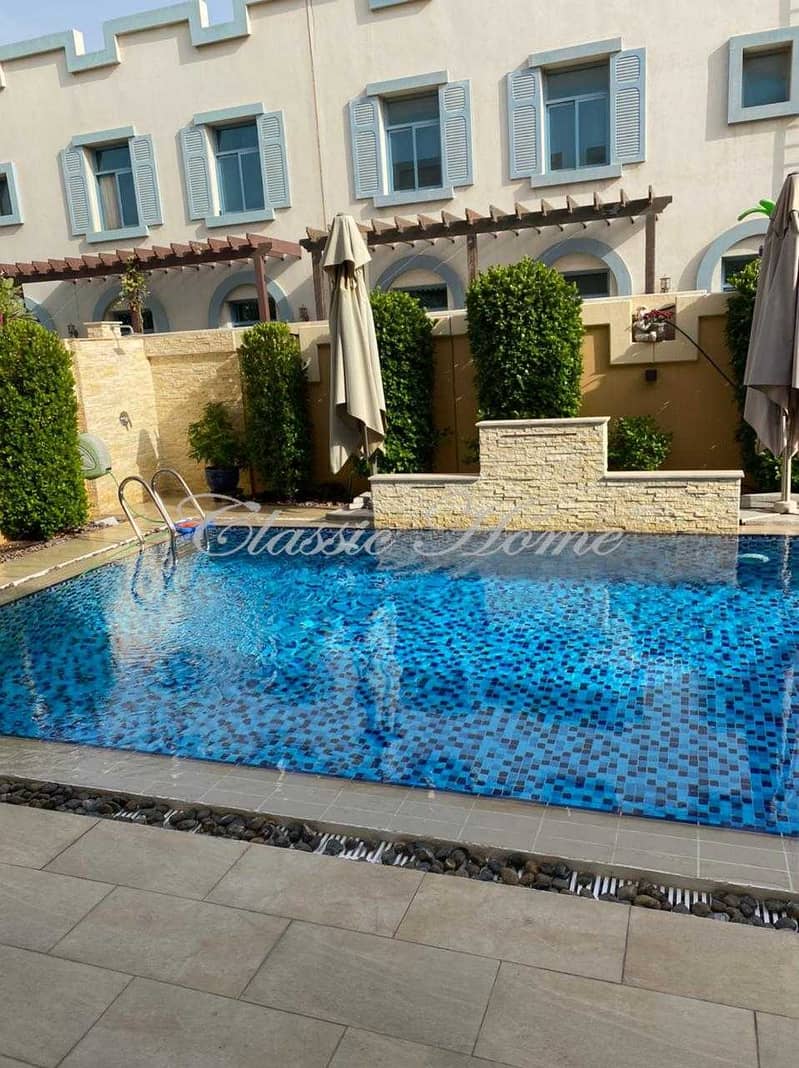 5 4 Bedroom + Maid’s Room+ Driver Room Townhouse Aegean Style – With Pool Kitchen Upgraded