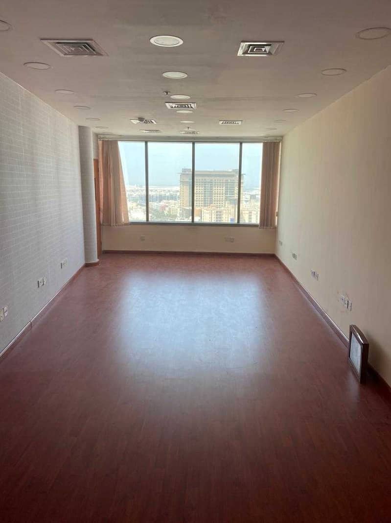 Partitioned Office Space for rent in a premium building on Al Makhtoum Road near the Clock Tower Deira