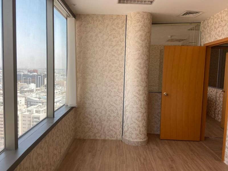 6 Partitioned Office Space for rent in a premium building on Al Makhtoum Road near the Clock Tower Deira