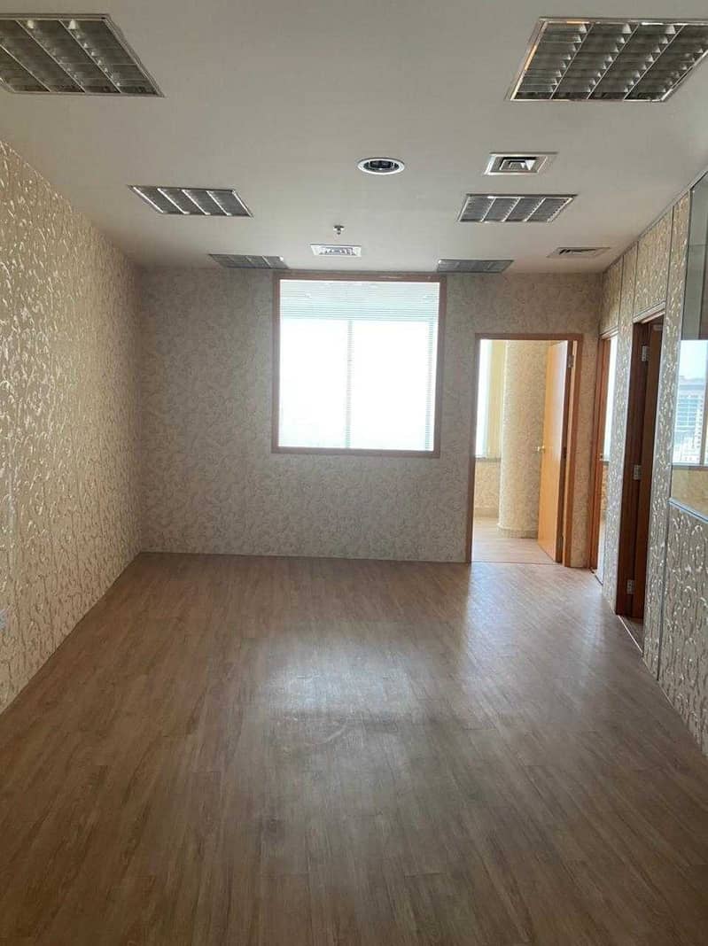 7 Partitioned Office Space for rent in a premium building on Al Makhtoum Road near the Clock Tower Deira