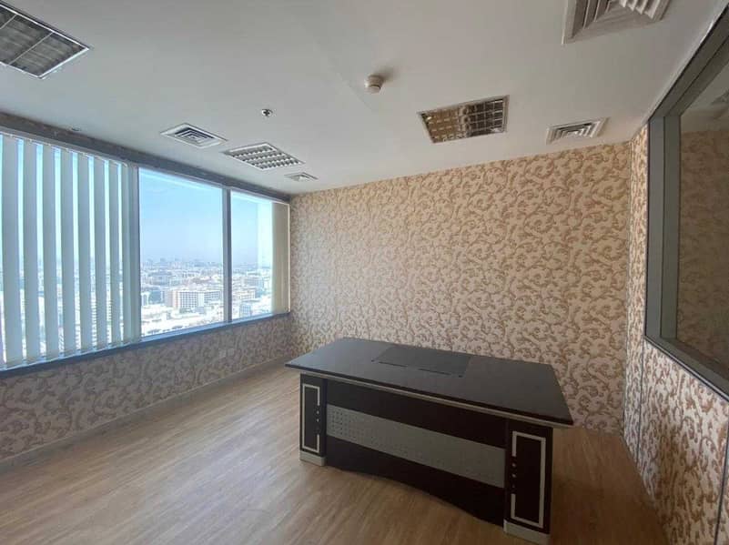 8 Partitioned Office Space for rent in a premium building on Al Makhtoum Road near the Clock Tower Deira
