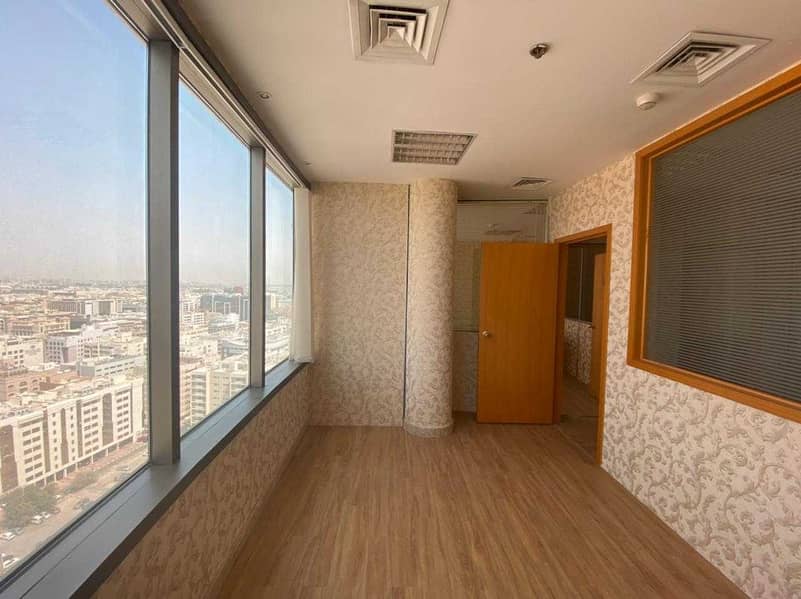 10 Partitioned Office Space for rent in a premium building on Al Makhtoum Road near the Clock Tower Deira