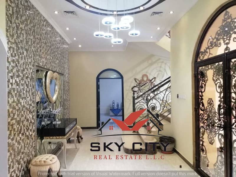 I own a villa in Ajman, central air conditioning, with a swimming pool, with furniture
