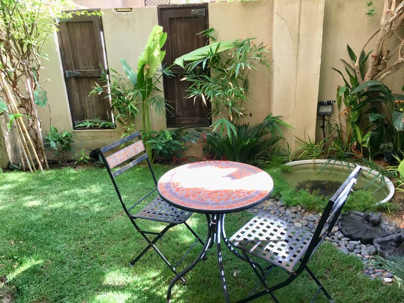 Large 1BR | Private Garden | Community view