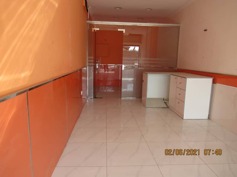 300 sq ft shop|road facing|false ceiling|ceramic flooring|1 month rent free|rent dhs 32k p/a