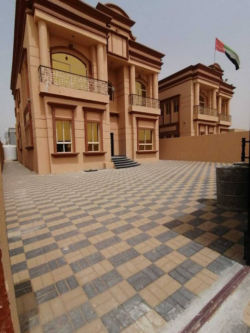New villa for sale in Al Mowaihat area, very high-end finishing, at a very excellent location, for a shot