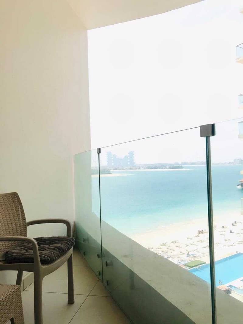 8 Luxurious 1BR with Stunning Sea Views on Palm Jumeirah