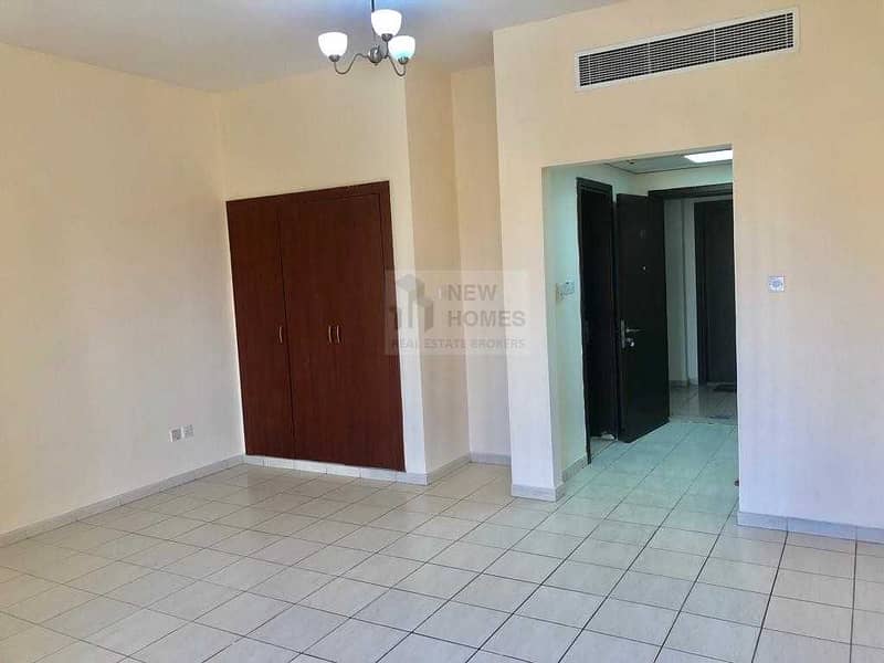 EXTRA LARGE STUDIO WITH BALCONY / FAMILY BUILDING / SPAIN CLUSTER / AED 22000 ONLY