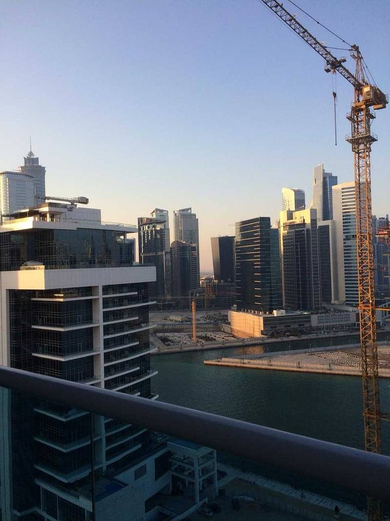 12 4 bed+storage room with FULL BURJ & CANAL VIEW in ELITE RESIDENCE
