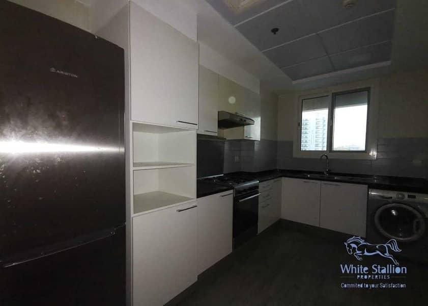 8 57K + CLOSED KITCHEN + SEMI FURNISHED 2BHK IN A HIGH END BUILDING