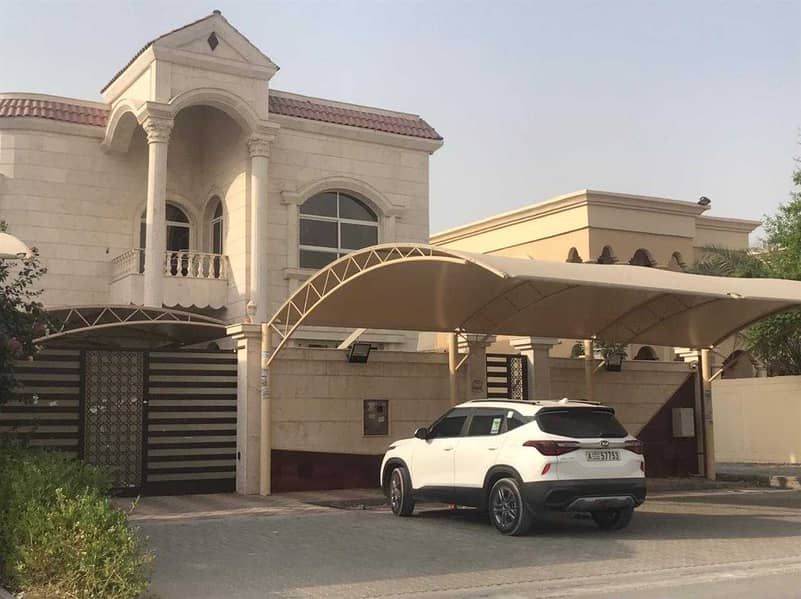 Villa for sale in Ajman on an asphalt street, freehold for all nationalities, with electricity and water