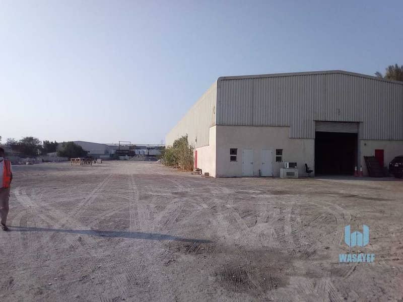 HUGE PLOT WITH A LARGE WAREHOUSE FOR RENT /10AED PER SQFT. .