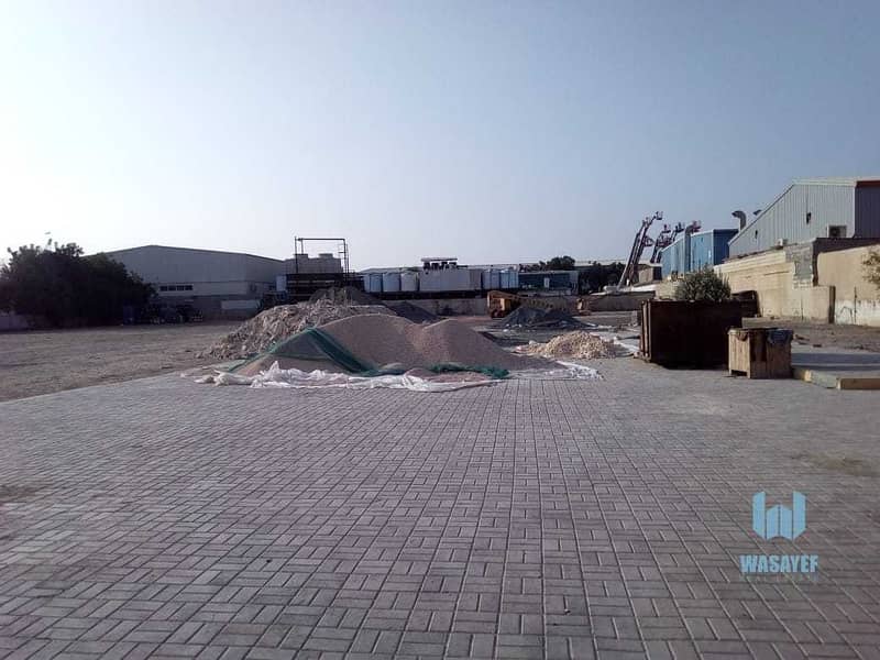 2 HUGE PLOT WITH A LARGE WAREHOUSE FOR RENT /10AED PER SQFT. .