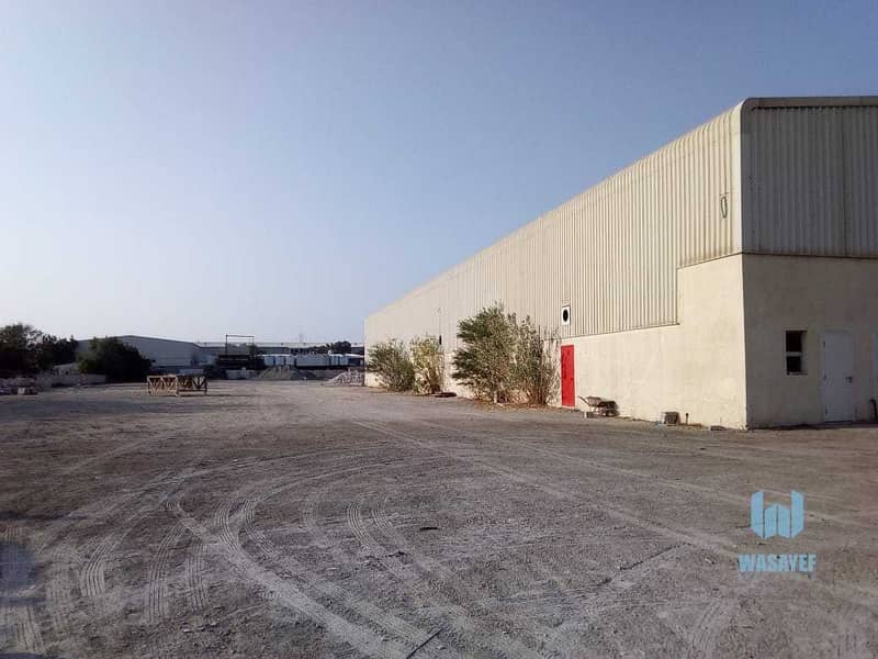 4 HUGE PLOT WITH A LARGE WAREHOUSE FOR RENT /10AED PER SQFT. .