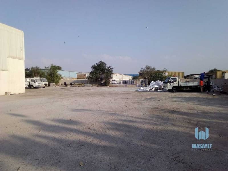 5 HUGE PLOT WITH A LARGE WAREHOUSE FOR RENT /10AED PER SQFT. .
