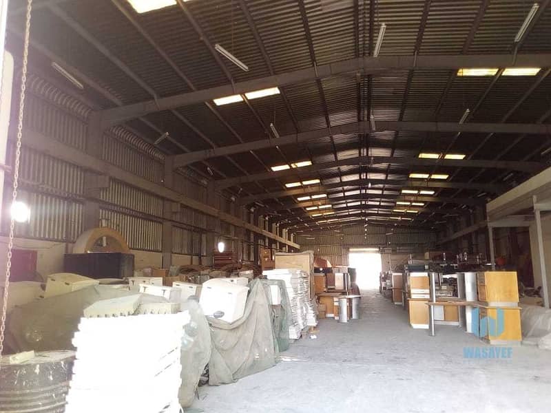 13 HUGE PLOT WITH A LARGE WAREHOUSE FOR RENT /10AED PER SQFT. .