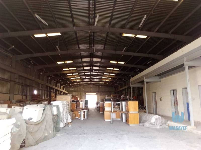 16 HUGE PLOT WITH A LARGE WAREHOUSE FOR RENT /10AED PER SQFT. .