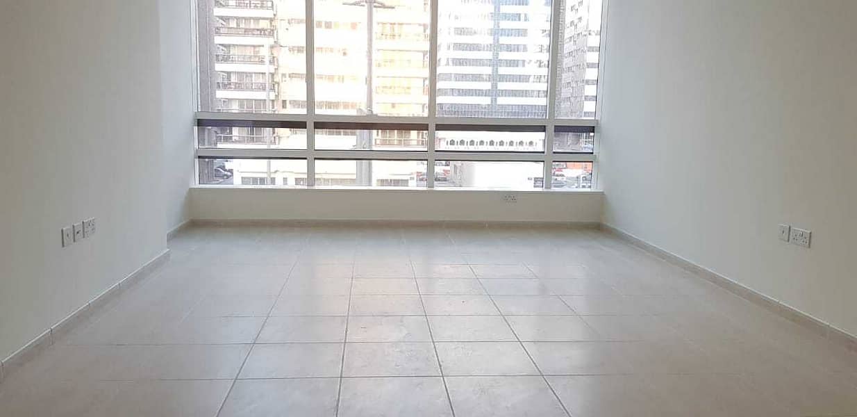 Amazing Deal ! 2 - BHK  Apartment  With Free Parking ! Hamdan Street !